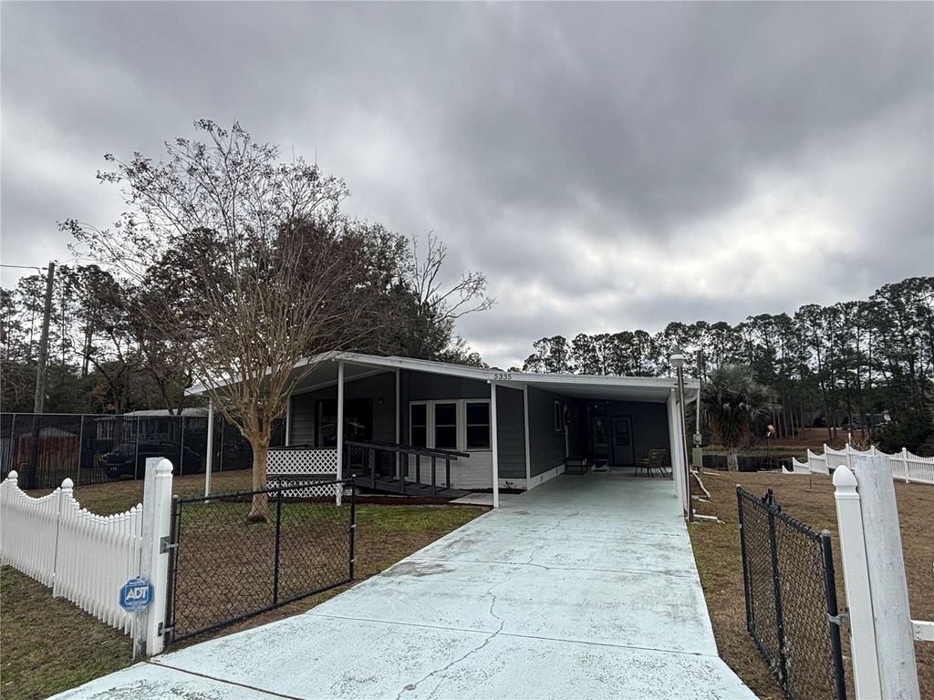 Photo of 5335 SE 186th Court, Ocklawaha, FL 32179 (MLS # OM717421)