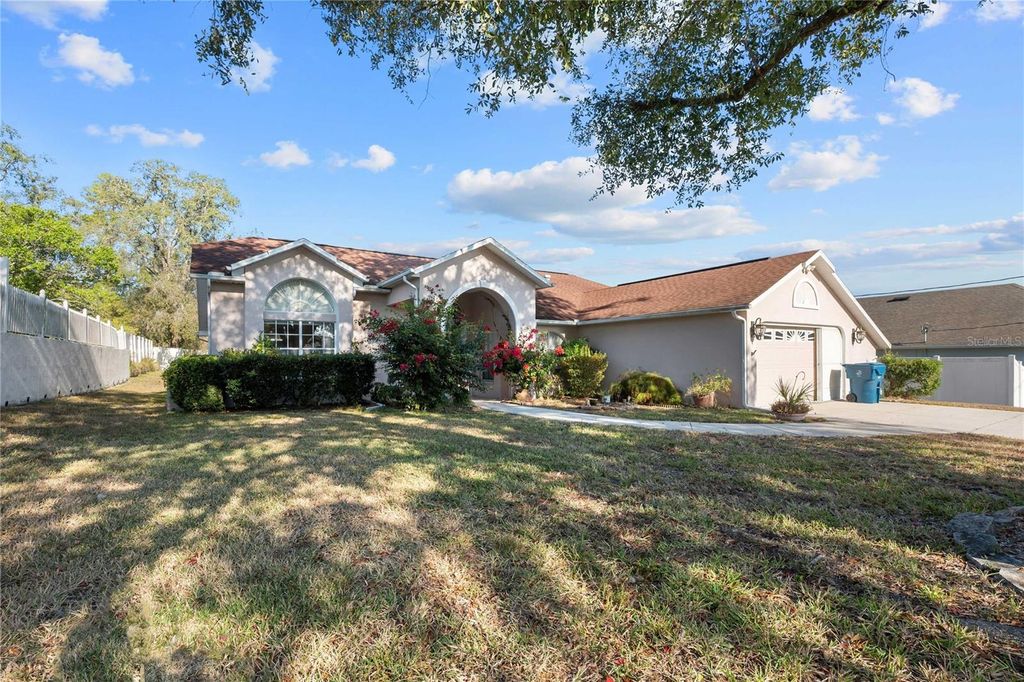 Photo of 13393 Drayton Drive, Spring Hill, FL 34609 (MLS # TB8415927)