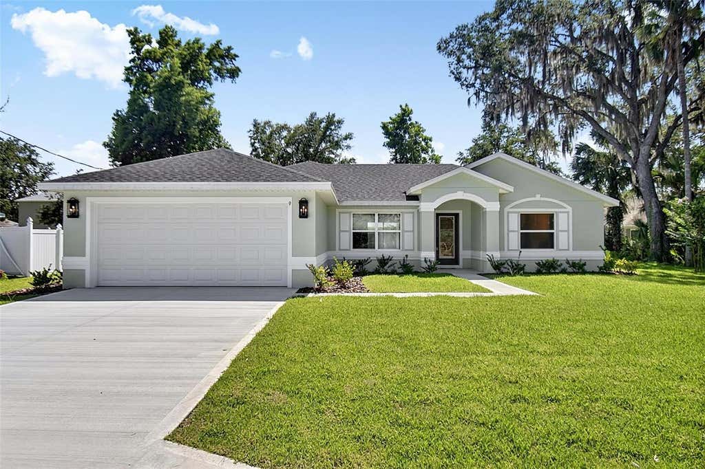 Photo of 14 Raemoor Drive, Palm Coast, FL 32164 (MLS # FC320277)