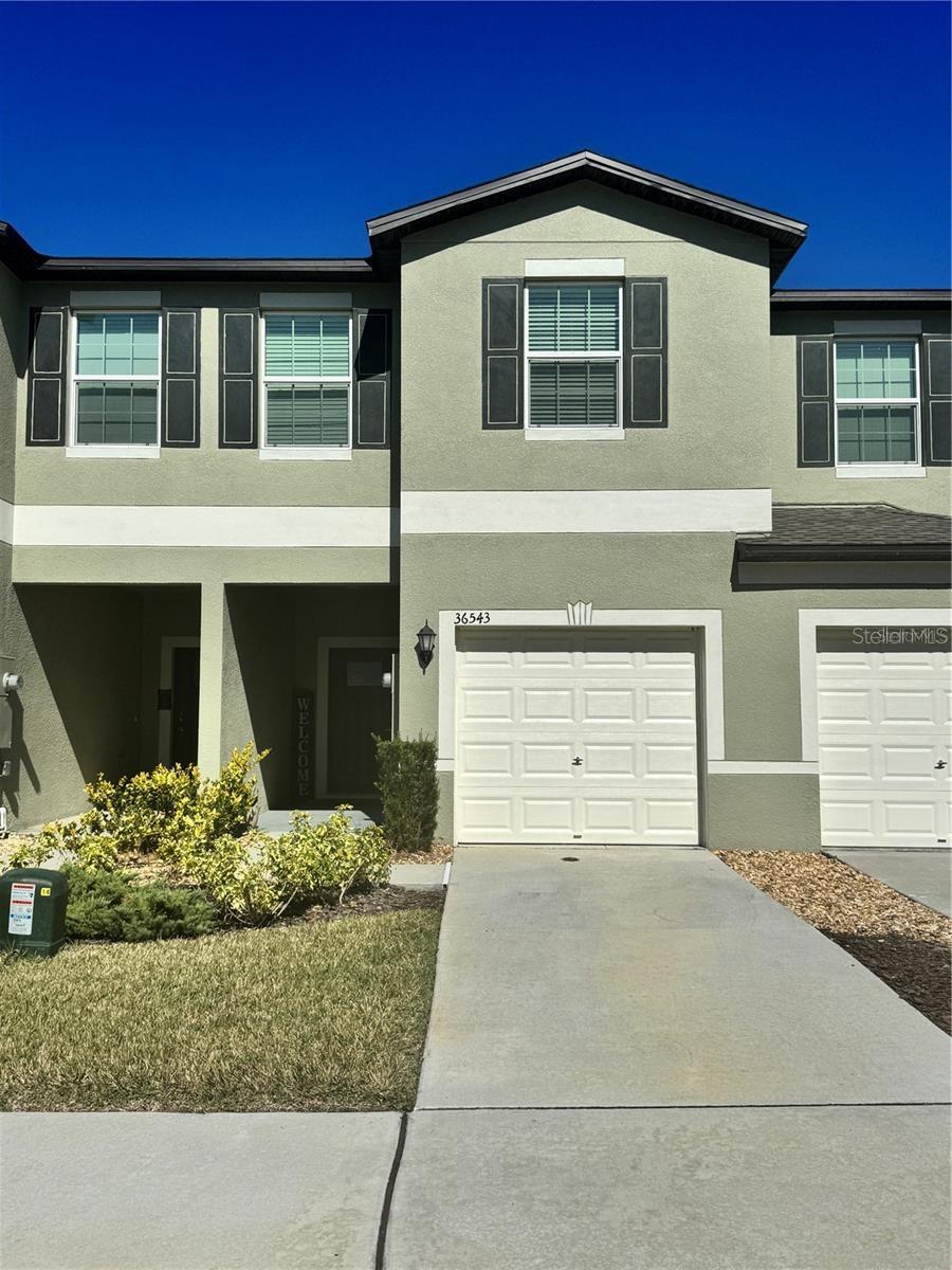 Available for Immediate Occupancy. Quick Move In Incentive Offered to Tenant by Landlord. Welcome to this beautiful, newer construction 3-bedroom, 2.5-bath townhome for rent, offering modern comfort and style in every corner. Situated in a sought-after neighborhood, this contemporary two-story home boasts a free-flowing layout that’s perfect for both entertaining and daily living. The main floor showcases a spacious kitchen that flows seamlessly into the bright and airy Great Room, ideal for gathering and relaxation. Step outside to the covered patio, perfect for enjoying outdoor moments. Upstairs, the generous owner's suite provides a peaceful retreat, complete with a private bath and ample closet space. Two additional well-sized bedrooms offer versatility for family, guests, or hobbies. A versatile loft space upstairs is perfect for use as a home office, playroom, or additional shared living area. With modern finishes, a convenient floor plan, and a prime location, this townhome offers both comfort and functionality. Don’t miss your chance to call this stylish property your new home! Schedule a tour today.