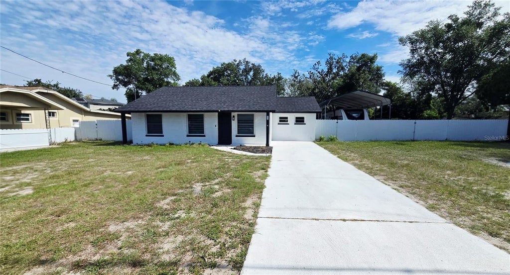 Photo of 4812 E 97th Avenue, Tampa, FL 33617 (MLS # TB8516882)