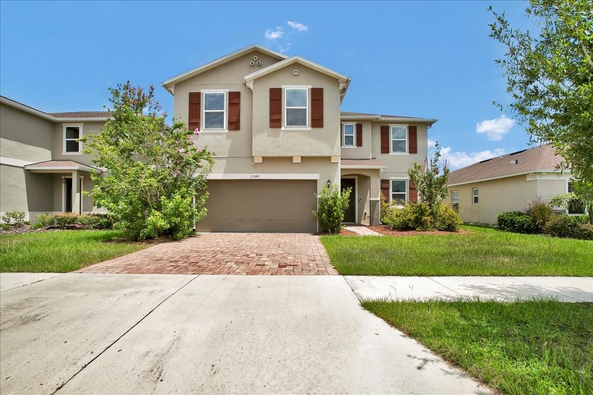 Welcome Home!! This MUST-SEE Amazing home boasts 4 bedrooms 2.5 Bathrooms, a 2-car garage located in the desirable South Fork Community. This home captures your attention from the street with its stately 2 story presence and upgraded pavers. As you enter you greet your guests in the wide foyer, high ceilings with luxury plank flooring as you walk into the large great room family gatherings. This open floor plan is light and airy with all the bells and whistles, upgraded crown molding and upgraded fixtures. The Great room overlooks the designer upgraded fully equipped kitchen that features stainless steel appliances, dark wood cabinetry, granite countertops, a breakfast bar and a double door pantry. From the great room through the glass sliders you enter to a screened spacious Lani that overlooks the calming pond and backyard. Next to the kitchen before you get to the inside garage entrance you have a convenient half bath downstairs. All 4 bedrooms are upstairs. After the stairs on second floor you are met with a loft space that can be used for computer area, office space, a home gym, game or home theater or just another relaxing space. New Carpet on stairs, in hall and in all 4 bedrooms. The spacious primary bedroom has an en-suite bathroom and a Huge walk-in closet with a window. The en-suite is upgraded with dual sinks and bathtub. The common area bathroom for the other 3 bedrooms has a shower and bathtub. For convenience the laundry room is also upstairs. South Fork subdivision is a wonderful family community that has it all, playground, dog park, resort-style pool, wide streets and recreation room located in the heart of Riverview close to shopping, state of the art new hospital, restaurants, and the top schools. Come and see this perfect home in the perfect South Fork Community! You will fall in LOVE!