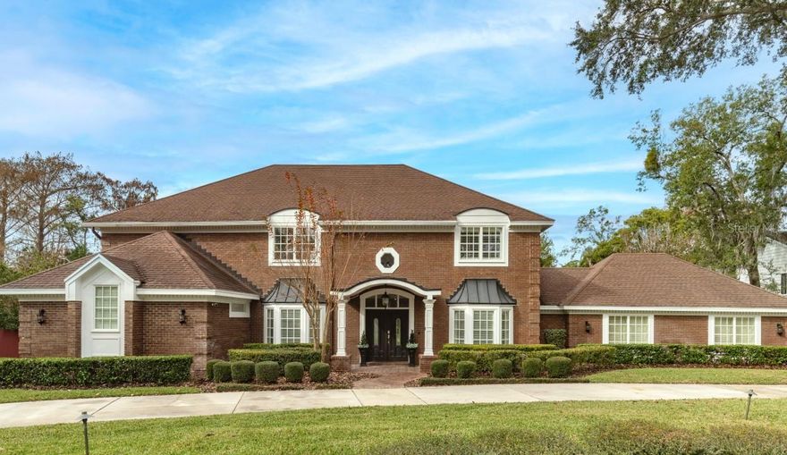 This large, open concept home on a huge lot is a rare gem in Winter Park. The current owners have renovated and decorated this home to absolute perfection! From the moment you enter the dramatic light-filled, two-story foyer be prepared to be impressed. A massive transitional space with open kitchen/living/dining greets you and is the perfect space for entertaining. The home is truly outstanding and features oversized double quartz islands with custom made cabinetry, high end appliances, custom trim carpentry throughout, and impressive finishes. The attention to detail is sure to wow you!

The master bedroom is conveniently located on the first floor and includes a wood burning fireplace, two walk-in closets, and an enormous spa-like bathroom with soaking tub, oversized shower, and built-in vanity and dressers. There are 4 additional bedrooms upstairs, two of which have turfed balconies overlooking the pool and beautifully landscaped backyard. Upstairs, also with access to the two large balconies, is an enormous bonus room currently used as an additional office and media/playroom with new custom built-ins and the second of three wood burning fireplaces in the home.

The three car garage was recently converted into a theater room which the current owner's family enjoys  with their many neighborhood friends. Although a perfect entertainment option, the garage doors remain outside and can be easily converted back into a garage prior to closing, at no cost to buyer, if desired. 

In addition to the many entertaining spaces inside, outside the home boasts a double decker backyard, outdoor kitchen with granite countertops, new custom deck and gazebo, firepit, dock, and small beach with kayak/paddleboard rack. The side yard has a special TRUGRID system underneath to allow for driving and parking! The serene yard offers a stunning view of a Mead Botanical Garden pond which leads to Lake Sue.

Every detail in this home has been carefully curated to create a residence that exemplifies comfort, style, and sophistication. This masterpiece is zoned Aubobon K-8 and Winter Park High School and just minutes from Lake Highland Preparatory School, Rollins College, and the shops and dining on Park Avenue. You will fall in love with this absolutely spectacular home!!