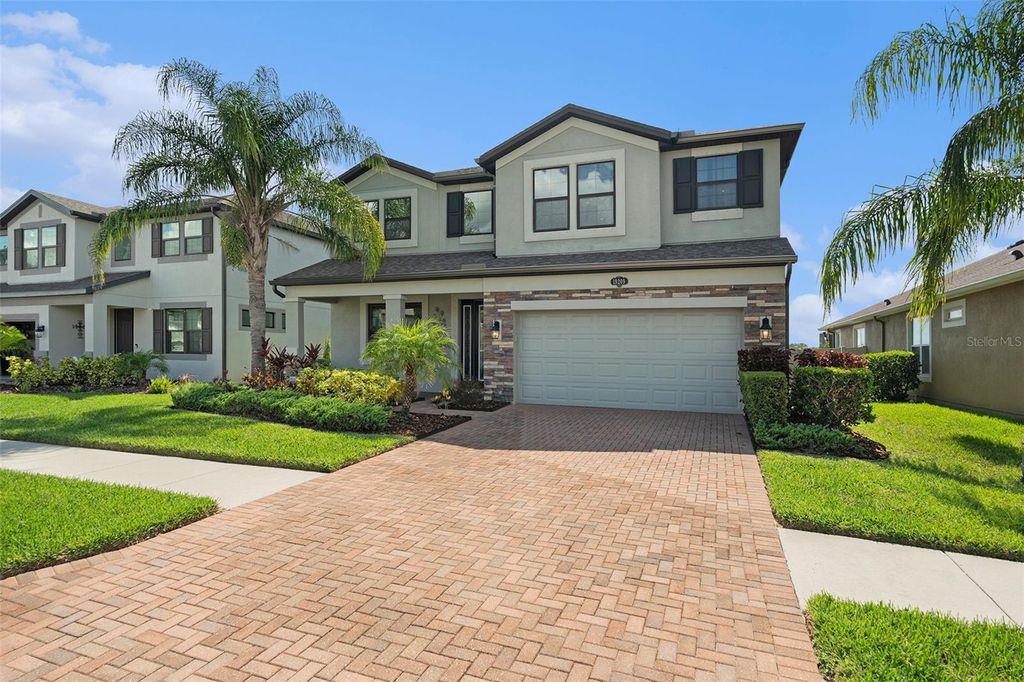 Photo of 19209 Long Lake Ranch Boulevard, Lutz, FL 33558 (MLS # TB8400434)