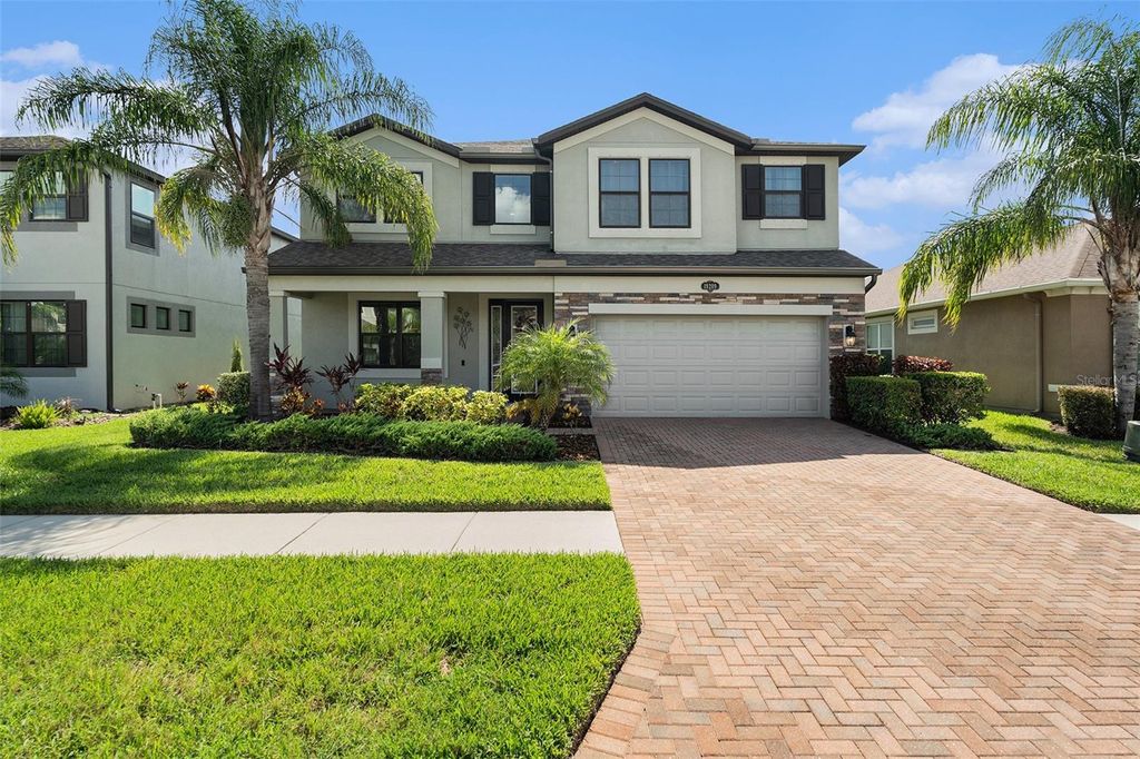 Photo of 19209 Long Lake Ranch Boulevard, Lutz, FL 33558 (MLS # TB8400434)