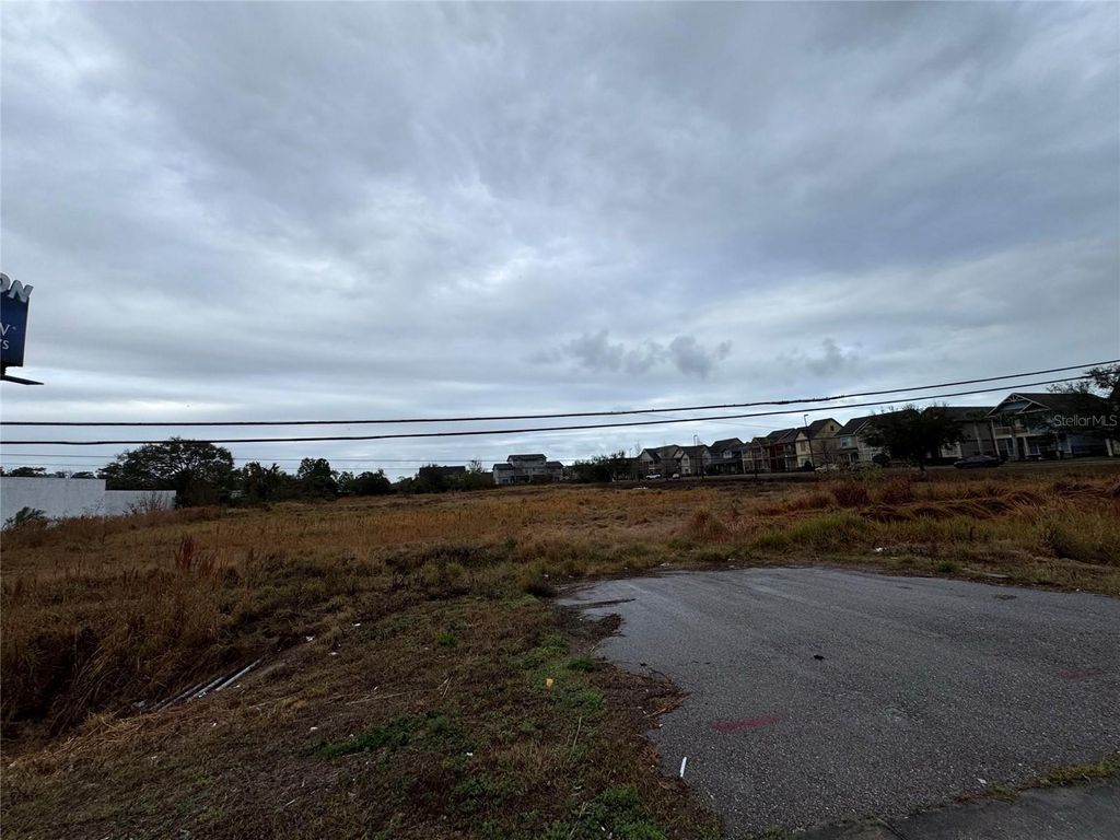 Photo of 11065 E Colonial Drive, Orlando, FL 32817 (MLS # O6400496)