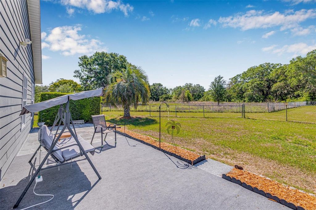 Photo of 37434 Derbyshire Drive, Zephyrhills, FL 33542 (MLS # TB8372594)