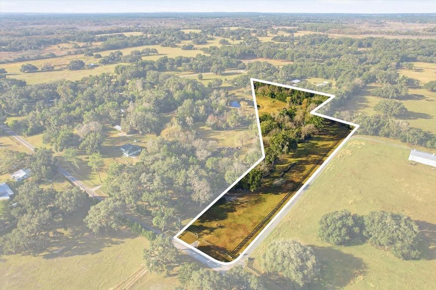 A True Naturescape Legacy: Discover This One-of-a-Kind West Central Florida Paradise. Welcome to a property that is more than just land; it is a meticulously sculpted, 25-year labor of love and a pristine environmental sanctuary. This rare offering presents the unique opportunity to own a world-away retreat that is secluded, yet incredibly accessible—less than 10 minutes to Bushnell and 20 minutes to Inverness. Feel the natural, restorative earth vibe that permeates this high and dry parcel, a proven high-ground location with a massive natural water retention area (DRA) ensuring security and peace of mind. The owner has worked in close consultation with the Florida Department of Environmental Protection, successfully completing an environmental reclamation project that has fostered a flourishing ecosystem of native fauna and flora. Imagine stepping into your own private naturescape, where crystal-clear aquifer-fed water features and established majestic native tree species thrive. The current meticulous maintenance includes a focus on natural health, avoiding fertilizers and pesticides to preserve the delicate balance. This is a quiet, low-density road, revered by residents for its deep sense of community, security, and the small-town Americana atmosphere; development is naturally restricted by protective zoning. This offering is particularly unique as it can be purchased in conjunction with the adjacent parcel, granting a buyer maximum acreage, privacy, and limitless potential. If you are searching for possibly the most beautiful and singular property in the region, ready for the construction of your custom dream home, look no further. This is a must-see for the discerning buyer who values privacy, natural beauty, and a truly unique investment. Do not delay—contact your agent today to schedule a private showing and experience the pride of this ownership opportunity firsthand.