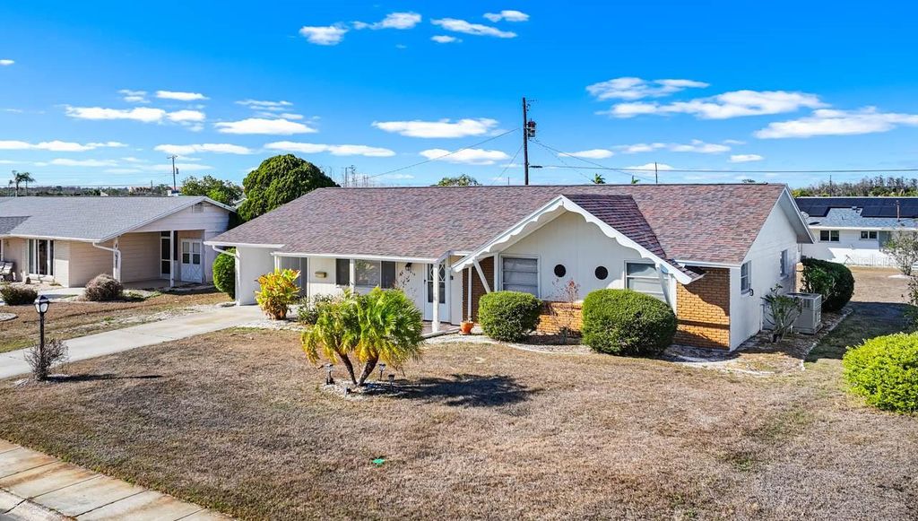 Photo of 1513 Arrowhead Drive, Sun City Center, FL 33573 (MLS # TB8480104)