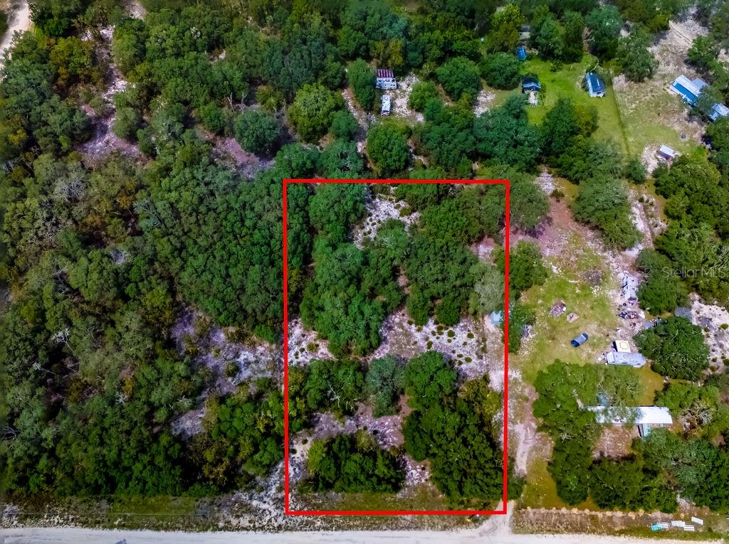 1.25-acre parcel zoned Rural Residential. Manufactured homes are permitted. Utilities include electric service through Central Florida Electric and high-speed fiber internet provided by Fiber by Central Florida. Conveniently located in Levy County, just a short drive to Gainesville and Ocala.