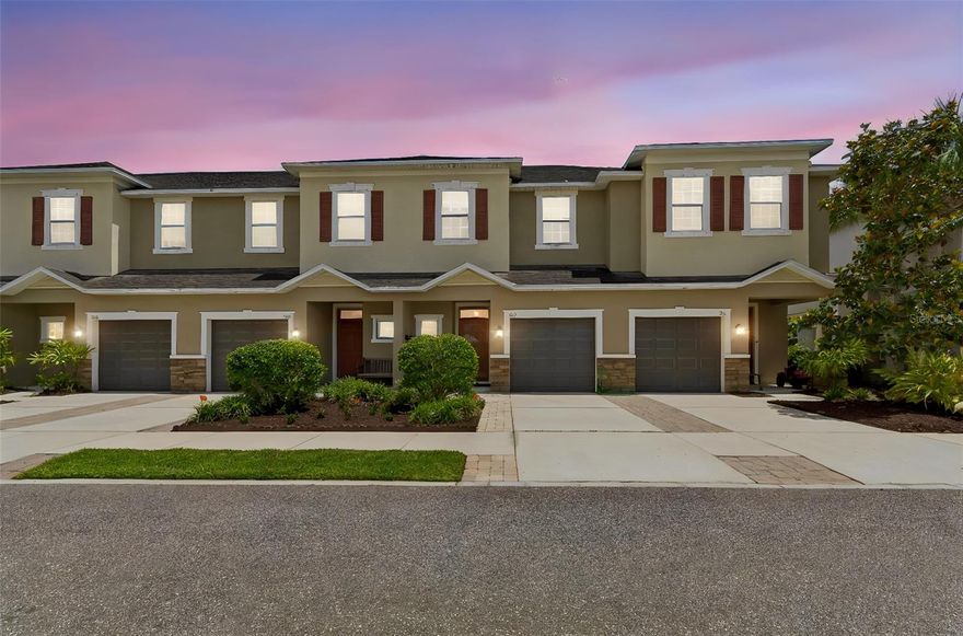 Welcome to Tuscany Woods! This beautifully  maintained 3-bedroom, 2.5 bath Taylor Morrison townhome, built in 2015, offers the perfect blend of style, comfort, and convenience in a gated Oldsmar community. Proudly owned by the original owner and located in a non-flood zone, this home sits high and dry with no history of flood or storm-related damage. Step inside to a light and airy open floor plan featuring crown molding and chair rail accents downstairs, upgraded Pottery Barn lighting throughout, updated ceiling fans, and all lighting on dimmer switches. The kitchen has been thoughtfully updated with quartz countertops, shaker wood cabinetry, stainless steel appliances, a larger upgraded kitchen sink. range with hood, solid wood shelving in walk-in pantry, and added lighting above the bar area. Additional upgrades include zebra blinds downstairs, a storm door with screen enclosure, custom closet system in the primary suite, and added cabinetry in the laundry room for extra storage and functionality. Enjoy relaxing on the screened-in patio and the convenience of a one-car garage. The HOA covers water, sewer, trash, roof maintenance, exterior paint, lawn care, and landscaping, offering low-maintenance living in a prime location close to shopping, dining, parks, beautiful Gulf beaches, and approximately 30 minutes to Tampa International Airport. This move-in ready gem is waiting to welcome it's next owners home!