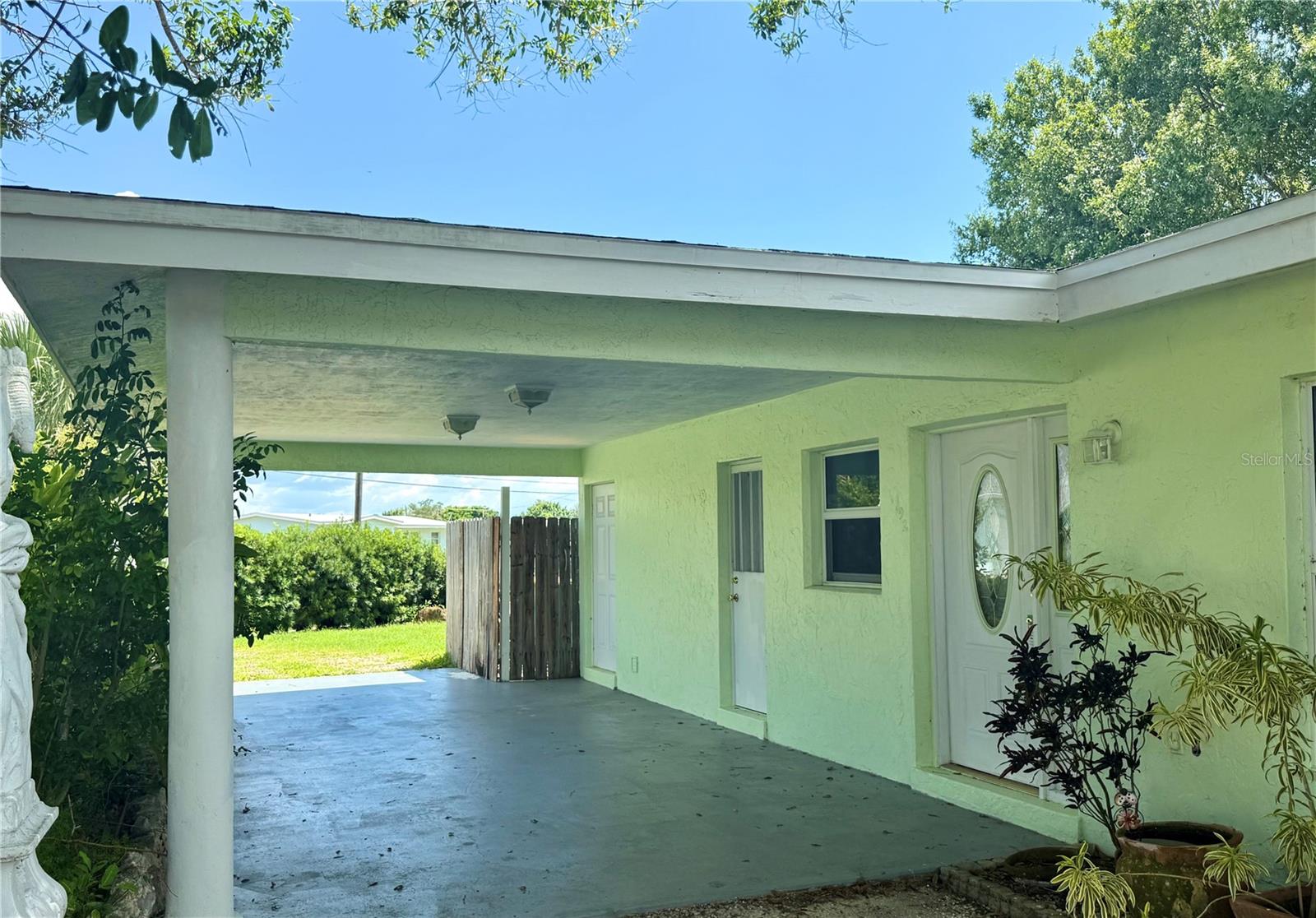 Opportunity for a smart, equity building fixer upper because of its desired South Port Charlotte location, offering significant potential for customization to make this home the style you desire. Well built home has Hurricane windows already in place with a well built covered carport with deep recessed concrete rebar & mesh reinforced posts built to withstand Florida weather. The property features a spacious layout complemented by hardwood flooring & a vaulted Florida Room that spans the entire rear of the residence. Sliding doors lead to a private, fenced backyard, ideal for pet owners & those that appreciate a tranquil, serene environment while remaining conveniently close to local amenities. The large corner lot has plenty of open space for an additional outbuilding or garage.
The primary bedroom includes a walk-in closet & a 3/4 bath. The residence has a sought-after split-bedroom plan, with a full bathroom situated steps from the 2nd BR. The lot offers a nice blend of mature trees providing shade plus a variety of Florida-native plants offer opportunities for propagation & landscape enhancement.
Located in the desired Higgs Park neighborhood with proximity to downtown Punta Gorda, Sunseekers, Fisherman's Village, and a diverse array of shopping, dining, & entertainment options. Higgs Park is a short stroll away offering covered picnic areas, playground facilities, basketball courts, shuffleboard & more. Additionally, Port Charlotte Beach Park, spanning 16 acres, is a short drive or bike ride, providing a huge swimming pool, fishing pier, boat launch, kayak/canoe rental & various sports such as tennis, volleyball, & horseshoe pits. The park also features restrooms, picnic areas, large pavilions, and a recreation center.
This homes location is surrounded by canals that lead to open water presenting an excellent opportunity for property value appreciation through renovation. Its proximity to downtown Punta Gorda, public boat launches, and newer, upscale neighborhoods underscores its potential. Ideal for buyers seeking to get the home style they want by upgrading in a vibrant community. Don’t miss this compelling opportunity for either personal use and real estate investment. See today!