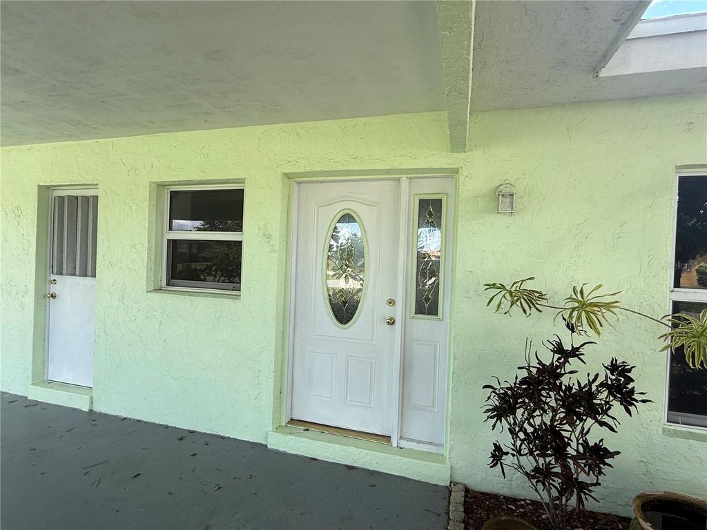 Photo of 192 Godfrey Avenue NE, Port Charlotte, FL 33952 (MLS # C7514825)