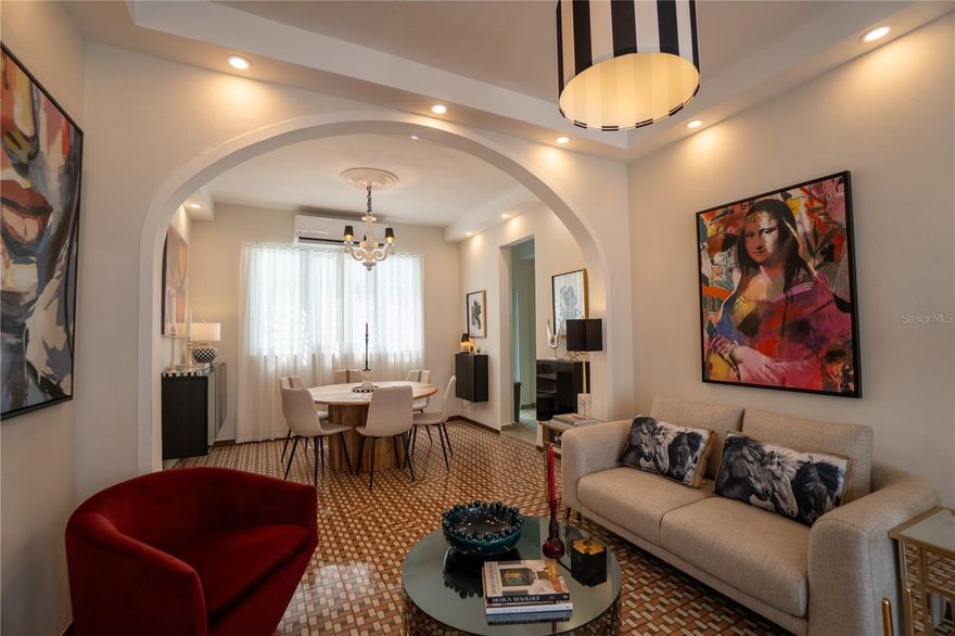 Charming penthouse located in a beautifully preserved Art Deco building at 1500 Calle Maribel in Condado, just steps from the beach, Parques, restaurants, cafés, and everyday conveniences.
The residence offers approximately 1,550 square feet of interior living space featuring high ceilings, elegant arched openings, and beautiful original decorative Art Deco ceramic tile floors that add warmth and timeless character throughout the home. The layout includes 3 bedrooms, 2 bathrooms, living room, dining room, family room, kitchen, and laundry room, with interiors styled in an eclectic design that complements the building’s historic architecture.
Expansive outdoor areas include a wraparound balcony and a private rooftop terrace, offering nearly 1,500 square feet of additional outdoor living space, ideal for entertaining or enjoying the ocean breeze.
Additional features include a service lift with direct access to the kitchen, one assigned parking space, power generator and the property is offered fully furnished and equipped.
Located on the 4th floor, this penthouse offers privacy, historic charm, and generous outdoor spaces rarely found in Condado.