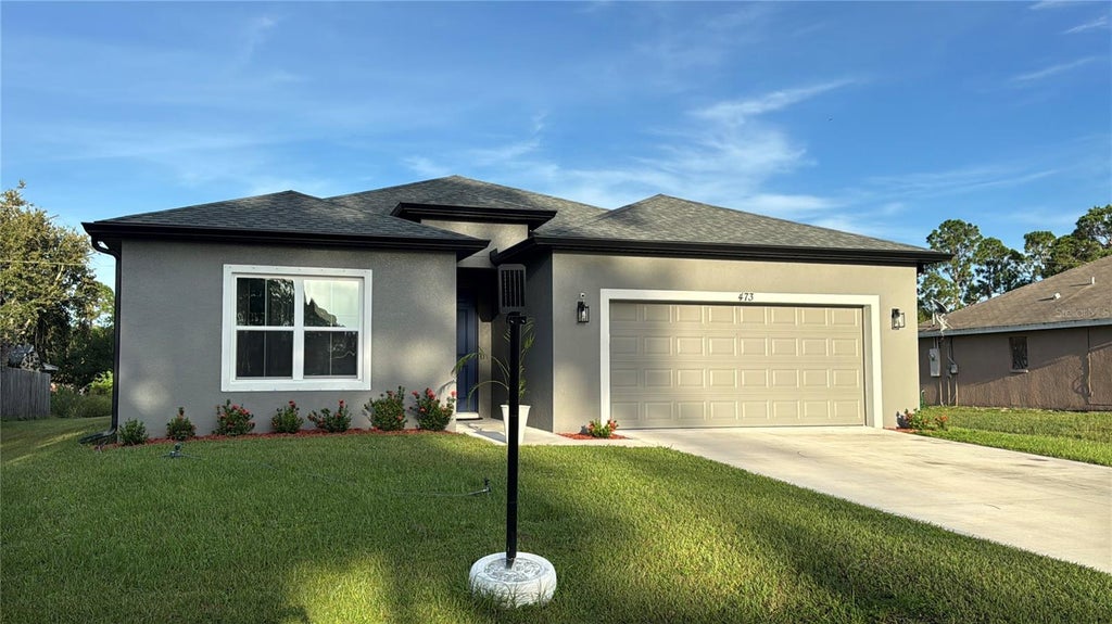 Photo of 473 Tropicaire Avenue SW, Palm Bay, FL 32908 (MLS # S5157057)