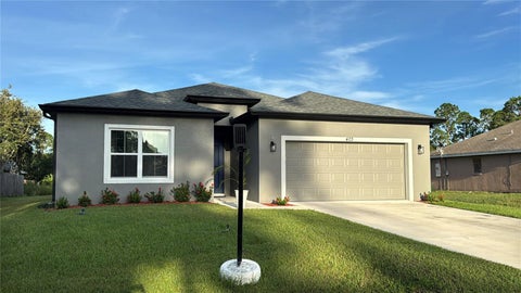 Photo of 473 Tropicaire Avenue SW, Palm Bay, FL 32908 (MLS # S5157057)