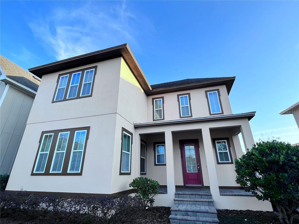 Photo of 8706 Tavistock Lakes Boulevard, Orlando, FL 32827 (MLS # S5141336)