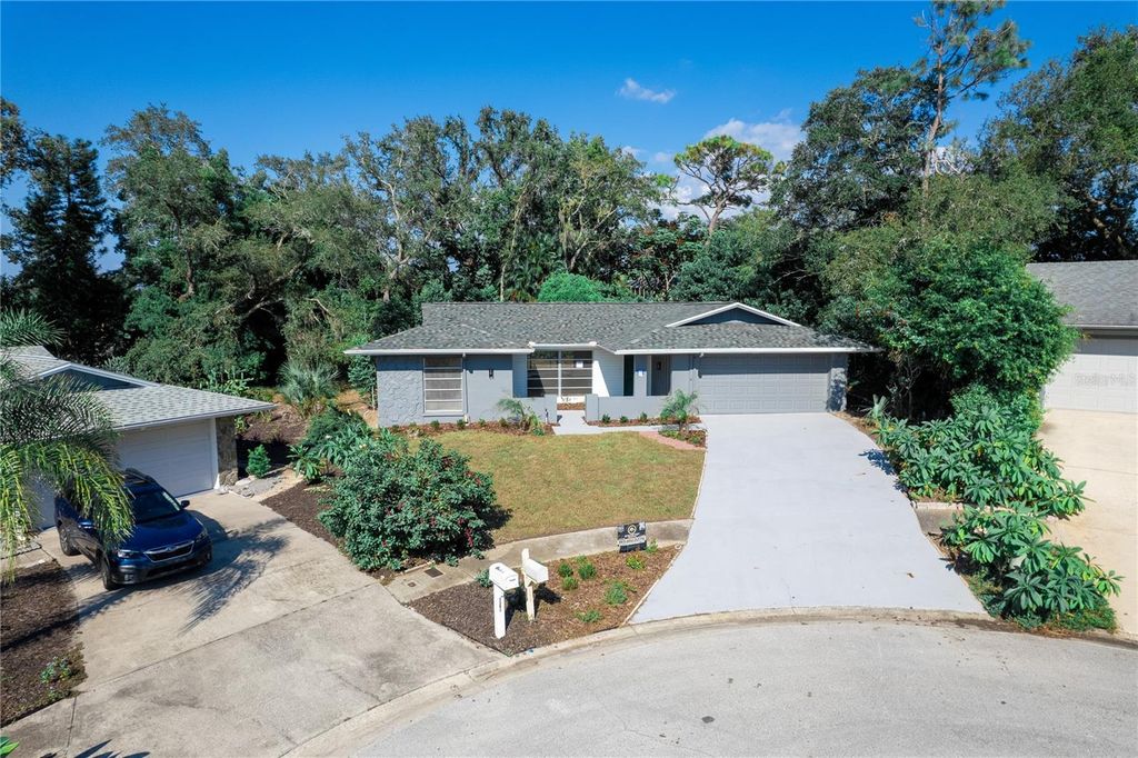 Photo of 1395 Burnt Oak Street, Tarpon Springs, FL 34689 (MLS # W7879161)