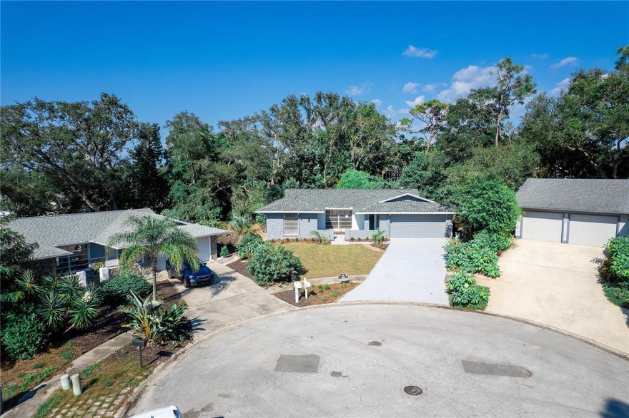 Peaceful Cul-de-Sac Living in Oakleaf Village – Nature, Comfort & Convenience
Welcome to this inviting 3-bedroom, 2-bath home nestled on a spacious quarter-acre lot in a quiet cul-de-sac, ITS FULL RENONATED ( NEW ROOF,NEW AC,NEW WATER HEATER,NEW FLOORING ,NEW KITCHEN,TWO NEW BATHROOMS, FRESH IN AND OUT PAINTING ,LANDSCAPING,NEW LIGHTNING) shaded by mature oak trees and surrounded by nature. With 1,700 square feet of living space and a 2-car garage, this residence offers a thoughtful layout and a serene setting—perfect for those seeking comfort and connection to the outdoors.
Step inside to a bright, open floor plan that flows effortlessly, offering both practicality and charm. The kitchen features solid wood cabinetry, a cozy eat-in counter, a hall pantry, and an adjoining dining area ideal for everyday meals or relaxed entertaining. Storage is abundant throughout, with walk-in closets in the bedrooms and plenty of space to keep life organized.
Enjoy your morning coffee on the screened lanai overlooking a Florida-friendly landscape, or unwind in the tranquil screened back porch—your own private retreat under the trees. Best of all, no flood insurance is required, adding peace of mind to this already appealing home.
Located in the desirable Oakleaf Village with optional HOA, you’ll love the proximity to:
- The scenic Pinellas Trail—just a short walk away for biking or strolls
- Beautiful beaches and lakes nearby
- Downtown Tarpon Springs—only 4 minutes away, full of charming shops, local eateries, and vibrant culture
- The historic Sponge Docks—just 8 minutes from your doorstep
This home blends natural beauty, thoughtful design, and unbeatable location. Come experience the lifestyle you’ve been looking for—schedule your showing today!