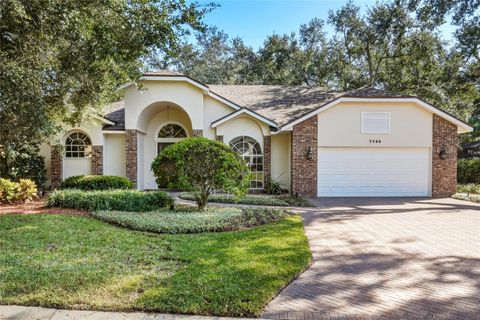 Photo of 7725 Apple Tree Circle, Orlando, FL 32819 (MLS # O6364188)