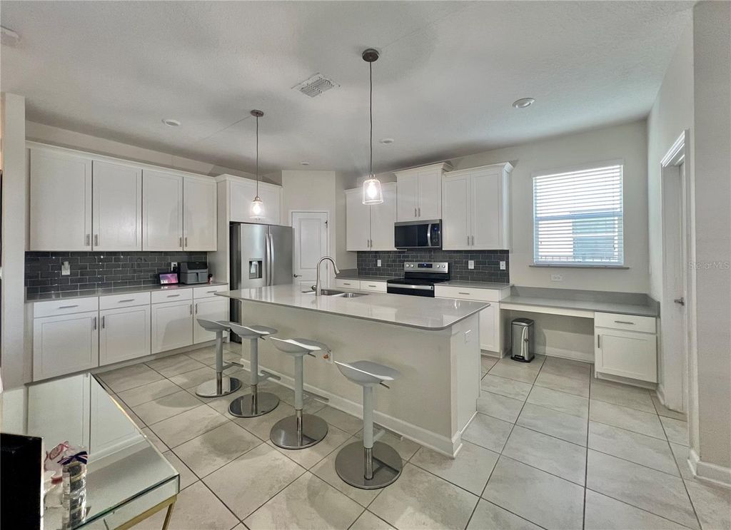 Photo of 11925 Fiction Avenue, Orlando, FL 32832 (MLS # O6368136)