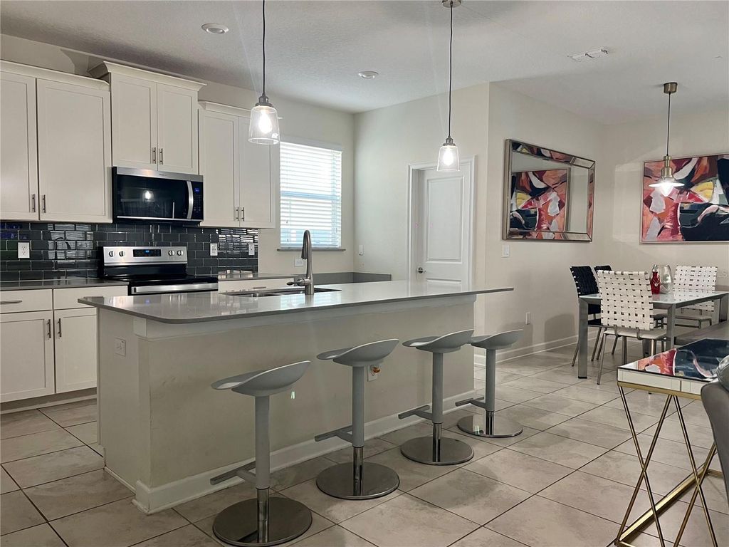 Photo of 11925 Fiction Avenue, Orlando, FL 32832 (MLS # O6368136)