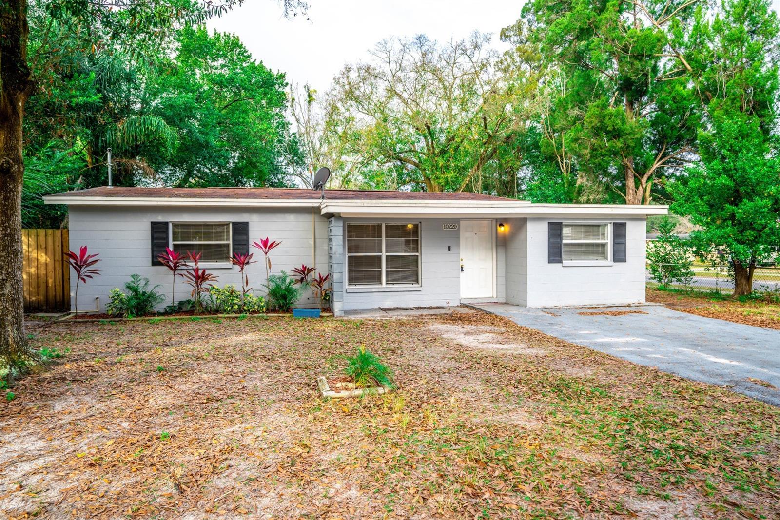 Concrete block 3 bedroom / 2 bath home offering 1,296 sq ft on a 6,992 sq ft lot in North Tampa. Single-level, practical layout with two full baths and interior washer/dryer hookups—no trips to the garage or shed. Flood Zone X (per public records). No HOA and no CDD, keeping ownership simple. Location puts you minutes from USF, Moffitt, Busch Gardens, everyday shopping/dining, and I-275 for direct access to downtown and TPA. The lot provides usable outdoor space for seating, pets, or a garden, and the footprint works well for either an owner-occupant or a rental near the university/medical corridor.