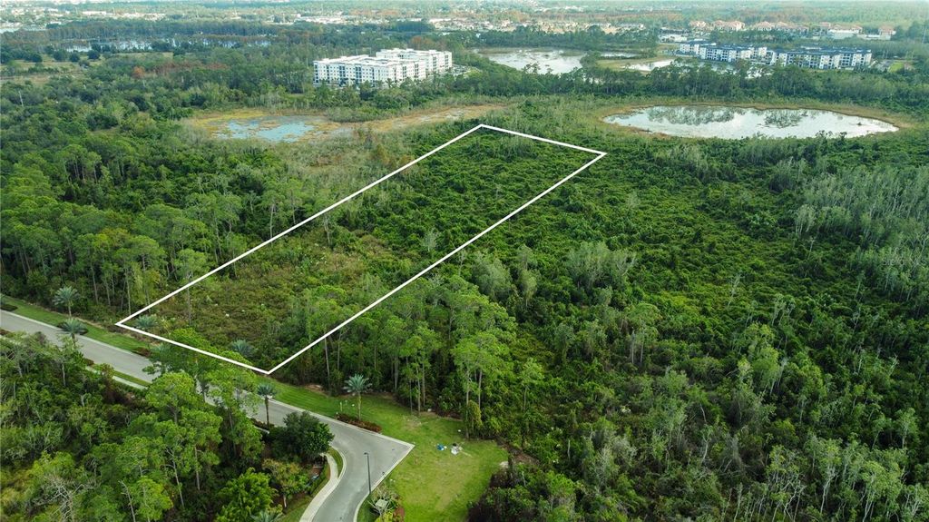 Photo of 17500 Grove Blossom Way, Winter Garden, FL 34787 (MLS # O6365970)