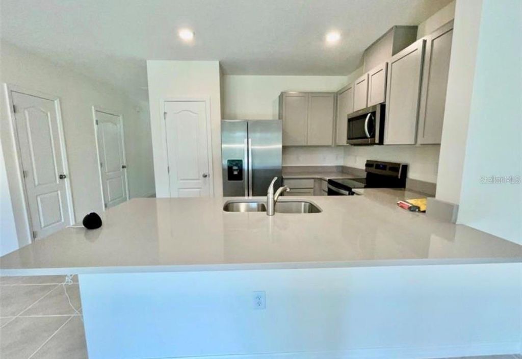 Photo of 1791 Rock Elm Road, Davenport, FL 33837 (MLS # O6391776)