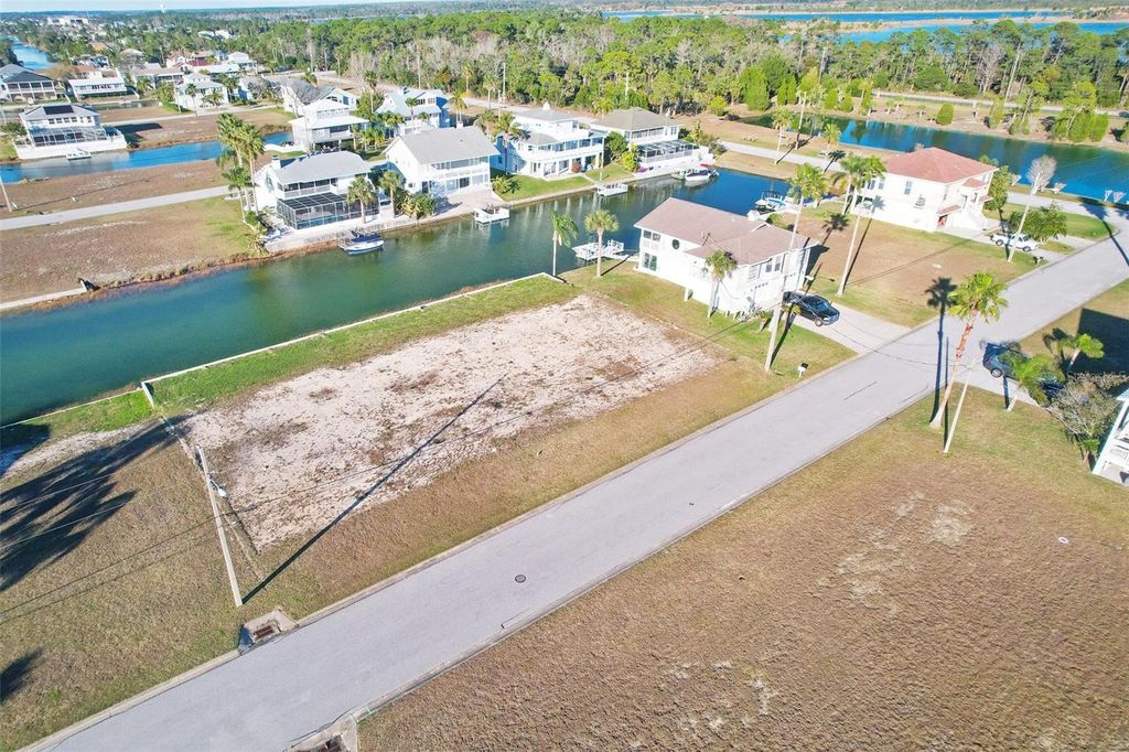 Photo of 4041 Triggerfish Drive, Hernando Beach, FL 34607 (MLS # TB8397385)