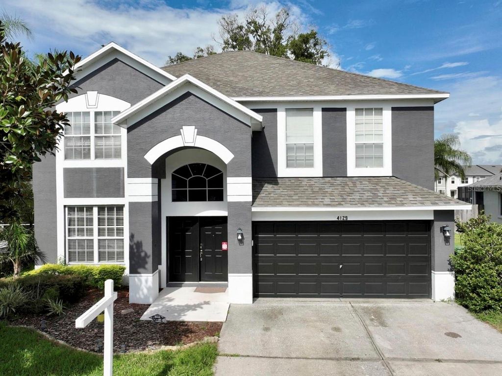 Photo of 4129 Tarkington Drive, Land O Lakes, FL 34639 (MLS # O6387858)