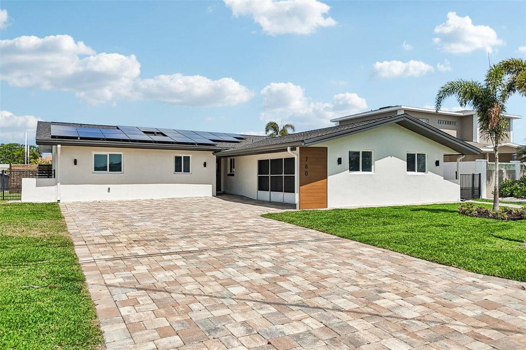 Photo of 760 115th Avenue, Treasure Island, FL 33706 (MLS # TB8491457)