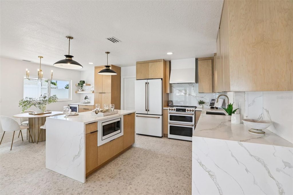 Photo of 760 115th Avenue, Treasure Island, FL 33706 (MLS # TB8491457)