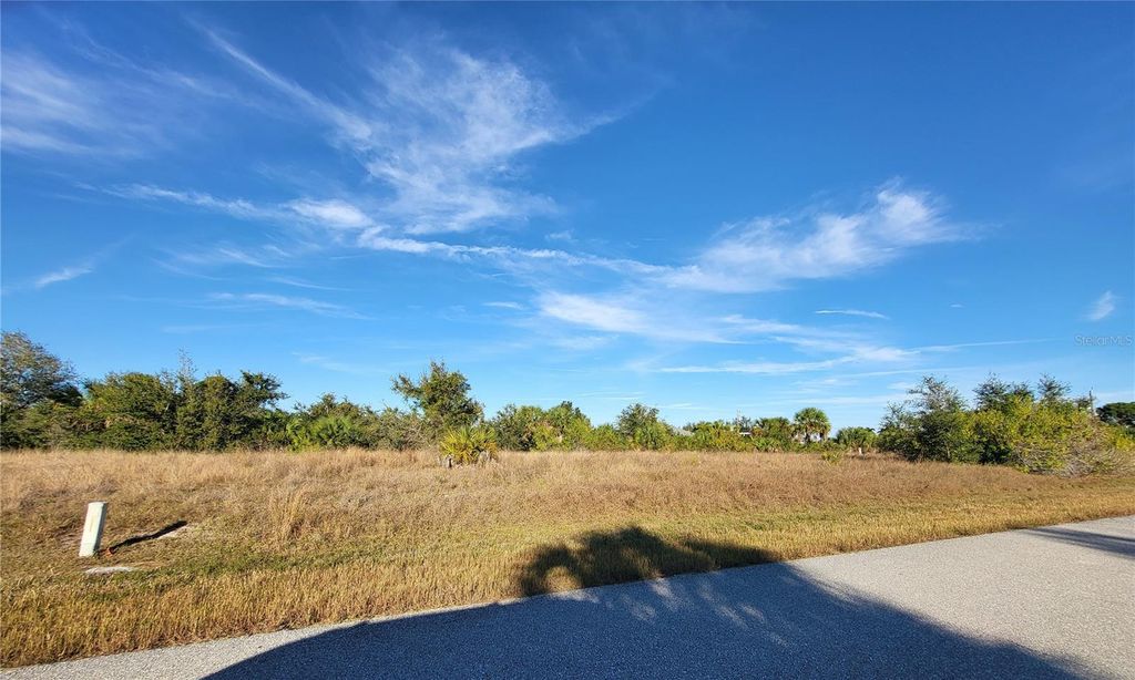 Photo of 13574 Allamanda Circle, Port Charlotte, FL 33981 (MLS # D6145213)