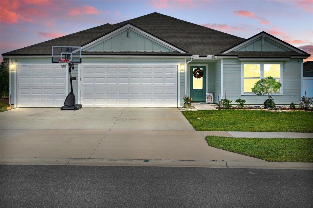 Photo of 52 Lumber Jack Trail, Palm Coast, FL 32137 (MLS # FC309686)