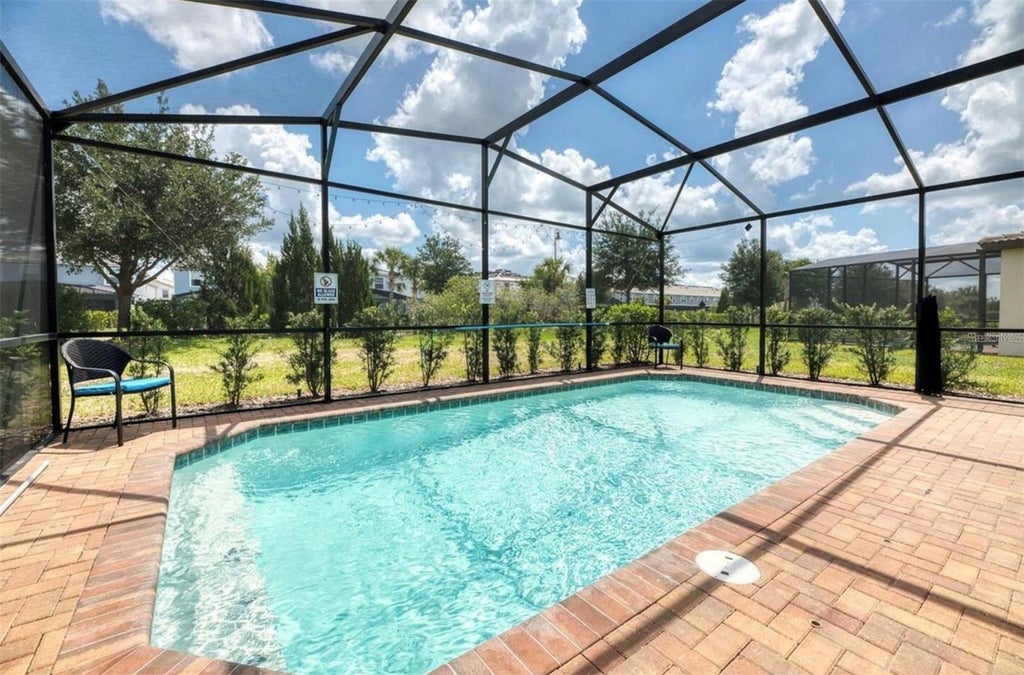 Photo of 5533 Misty Oak Circle, Davenport, FL 33837 (MLS # O6437488)