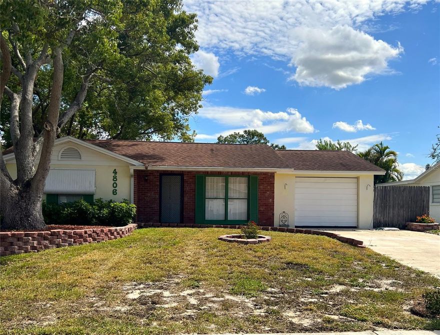 Are you in search of an exceptional home filled with boundless potential and an array of amenities? Welcome to Tanglewood Terrace, nestled in the heart of New Port Richey, Florida. This delightful single-story residence boasts 2 bedrooms, 1 ½ bathrooms, 1 car garage and a spacious 1,008 square feet of living space, making it absolutely move-in ready! The home's immaculate curb appeal and well-maintained mature landscaping create an inviting atmosphere, complemented by a fenced yard that provides privacy and a screened porch, perfect for hosting gatherings and enjoying the outdoors. Conveniently situated near various shopping centers, numerous medical facilities, and local hospitals, this home is perfectly positioned to meet your lifestyle needs. Additionally, you'll appreciate the easy access to the Gulf of Mexico, and the best part? No need to worry about flood zones. Don't let this exceptional opportunity slip through your fingers—schedule a viewing today and discover the endless possibilities that await you at Tanglewood Terrace!