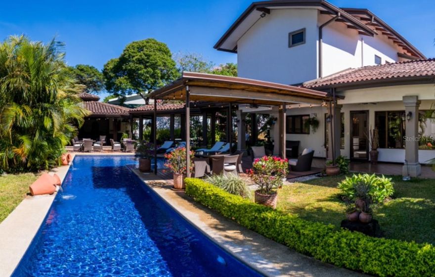 Where Life Slows Down and You Begin Again! Sun & Green Retreat | Santa Ana, Costa Rica. 
There’s a place where the mornings begin with birdsong, where sunlight dances across a saltwater pool, and time feels like it belongs to you again.
Nestled in one of Costa Rica’s most coveted neighborhoods, Sun & Green Retreat isn’t just a home, it’s a return to balance, to beauty, to intention. This private estate was designed to be lived in deeply: from its lush organic garden and fruit trees to the handcrafted wood bar, open-air rancho, and serene walking paths that lead you nowhere in particular, except inward.
Behind its gated entrance, the world slows down. Inside, natural light spills through open spaces, fine finishes wrap every corner with warmth, and every room speaks the language of comfort and sophistication.
This is a home for dreamers. For those who host with heart. For those who know the true luxury isn’t just about what you own,-it’s about how you live.
Whether you’re seeking a personal sanctuary or a strategic international investment, Sun & Green Retreat offers a life of beauty, privacy, and connection, just minutes from the vibrancy of San José and the calm of the Pacific coast.