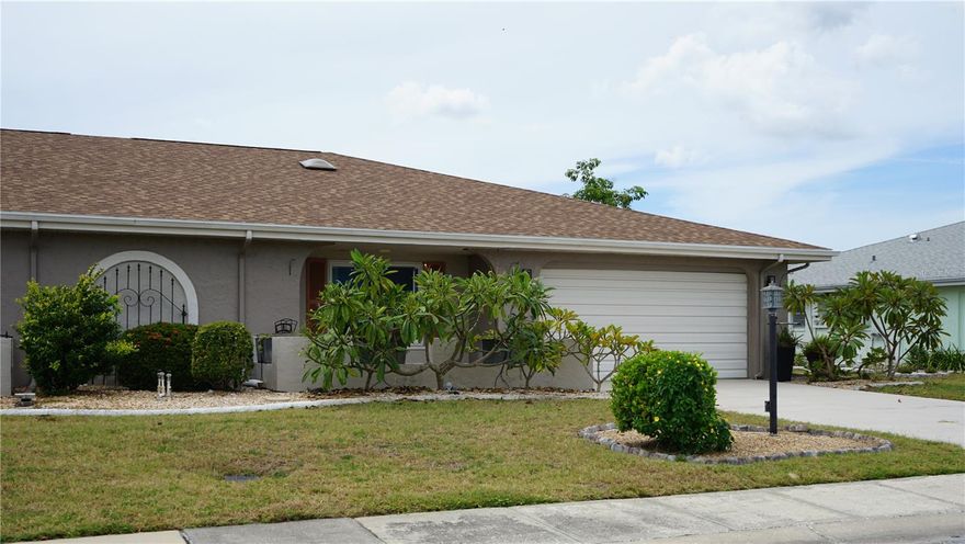 Sun City Center is a premier retirement community located an hour south a Tampa. You'll enter on a front porch with a east facing view then into the living space that has a large window providing light into the home. Followed by the dining area and a solar tube next to the custom kitchen with granite tops, rollouts, deep drawers, a nice fridge and a 2 drawer stove. This Dedham floor plans features 2 owner suites separated by a family room with the lanai right outside the sliding door. You have a 2 car garage with the large laundry room here as well for extra storage. Sun City Center has plenty of clubs, bus trips and more to keep you busy. This home comes with lawn care !!
