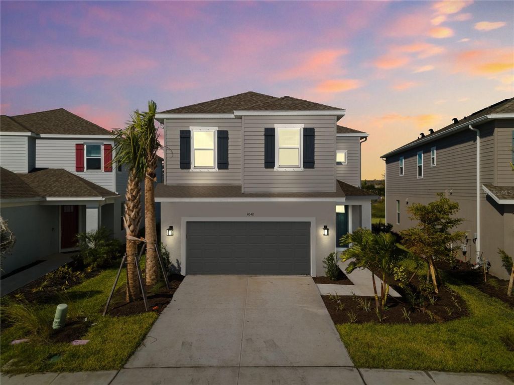 Photo of 9048 Tequila Sunrise Drive, Sarasota, FL 34241 (MLS # A4667489)