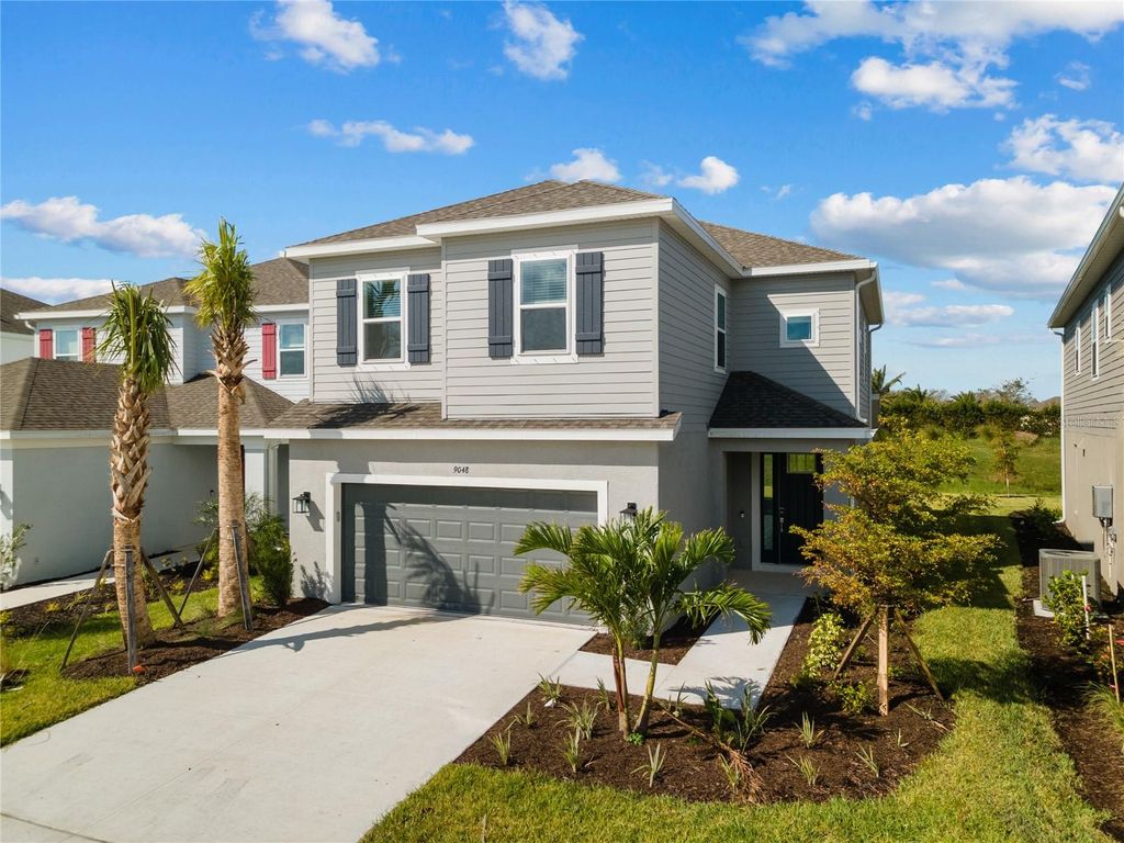Photo of 9048 Tequila Sunrise Drive, Sarasota, FL 34241 (MLS # A4667489)
