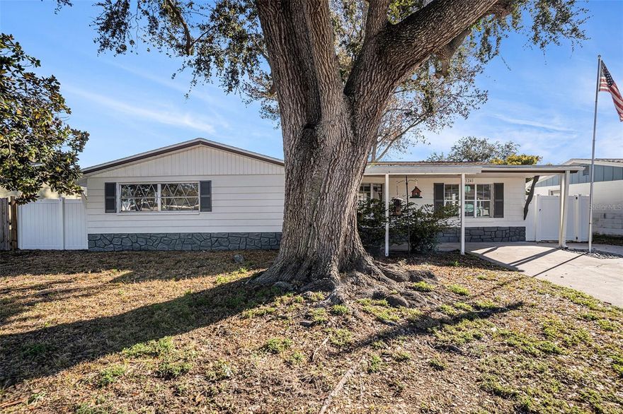 Under contract-accepting backup offers. One or more photo(s) has been virtually staged. Welcome to your new 3 bedroom and 3 bath home with beautifully remodeled 2 bathrooms and vinyl flooring. When you walk into your home you will find the living room, breakfast area and kitchen. Off to the left is your master bedroom and another secondary bedroom and bathroom. To the right of the living room is the third bedroom with its own private bathroom and also has its own access to go outside to the backyard. Large sun room in the back of home which leads out to your screened in patio. There is a large shed in your fence backyard.