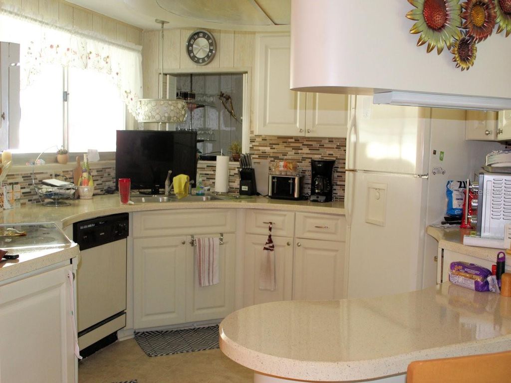 Photo of 129 Royal Palm Circle, Largo, FL 33778 (MLS # TB8418462)