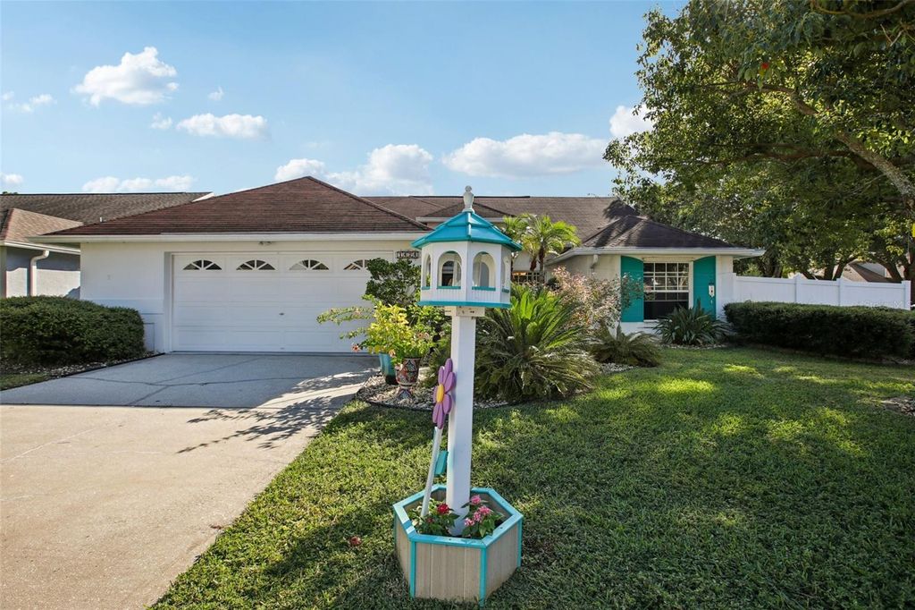 Photo of 1424 Ridge Shore Drive, Tarpon Springs, FL 34689 (MLS # TB8437861)