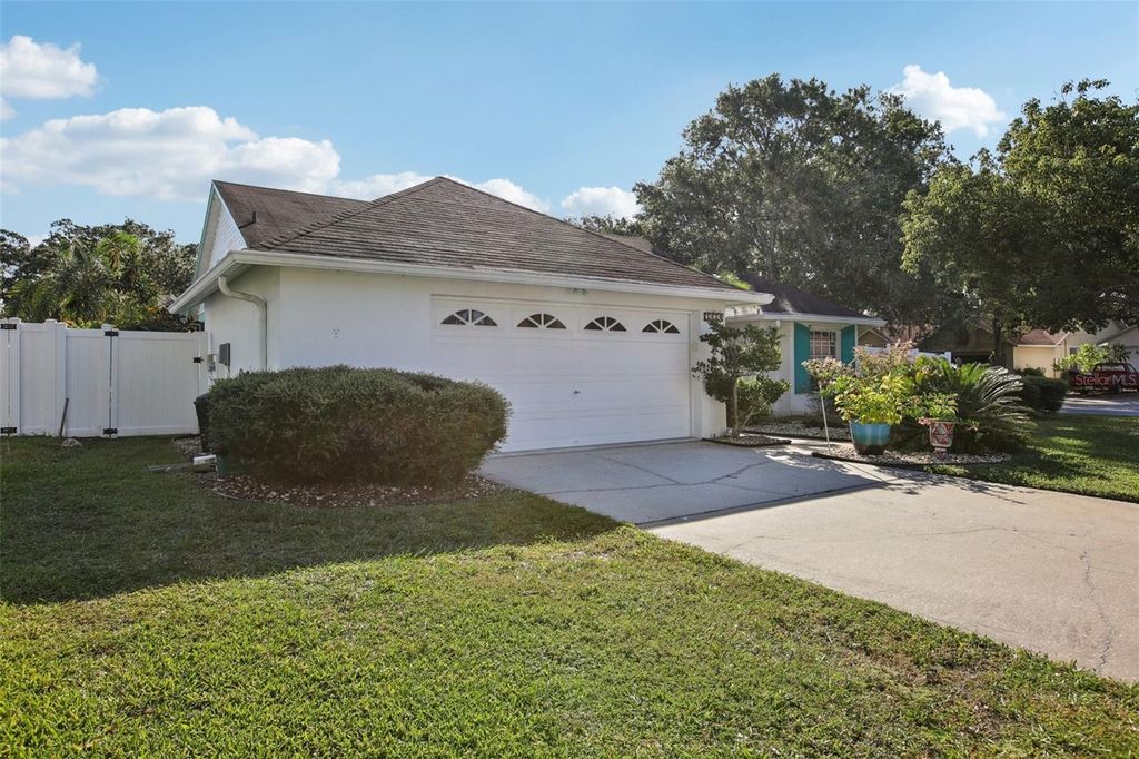 Photo of 1424 Ridge Shore Drive, Tarpon Springs, FL 34689 (MLS # TB8437861)