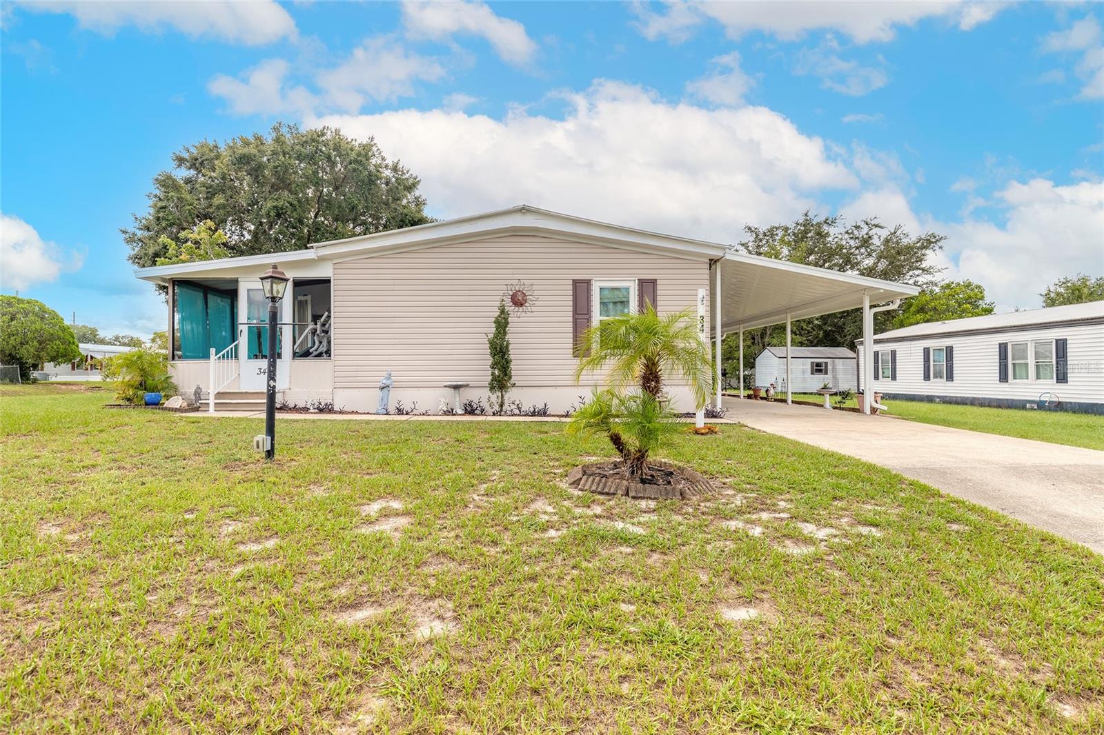 Check out this fully updated home in Terra Alta! The screened porch offers a relaxing place to enjoy your morning coffee. This corner lot exterior features newer siding, a new carport perfect for two cars, and a rear shed. Inside you will find 3 spacious bedrooms and two fully renovated bathrooms. Water heater and windows installed in 2022. Schedule your private tour today! All measurements and information are intended to be accurate but must be verified by Buyer/Buyers Agent