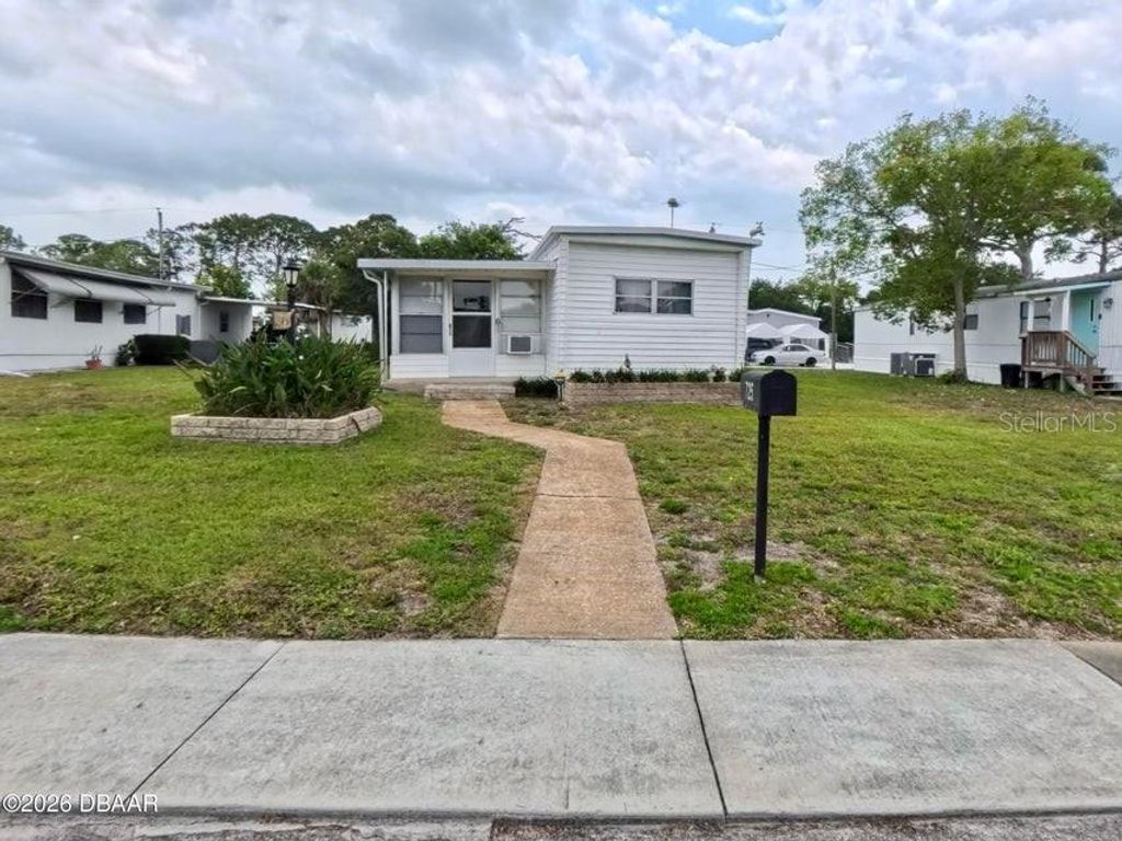 Photo of 725 Marshall Circle, Port Orange, FL 32127 (MLS # V4949980)
