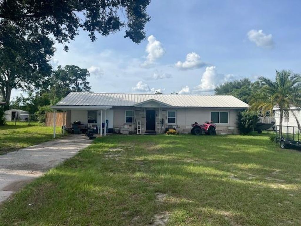 Photo of 400 E Pomelo Street, Lake Alfred, FL 33850 (MLS # P4935331)