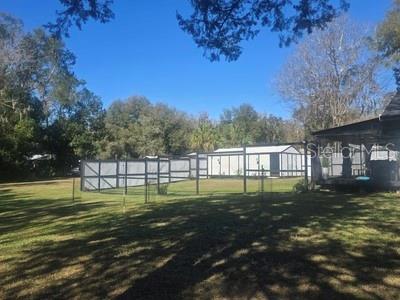 E242 FT OF N1/2 OF NW1/4 OF SW1/4 LESS N200 FT THE - Residential