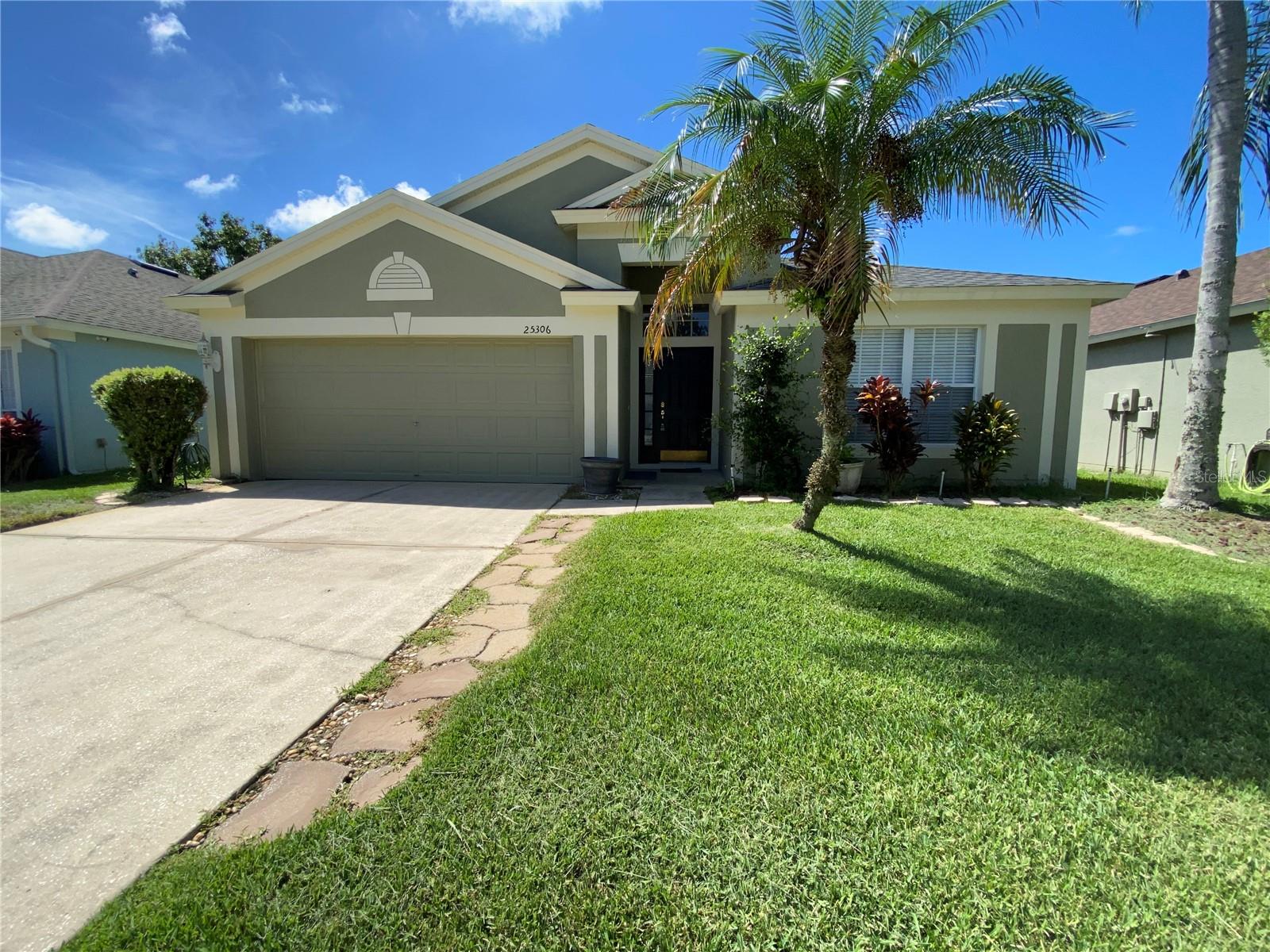 Welcome to this inviting 3-bedroom, 2-bath single-story home in the highly desirable Lexington Oaks community! From the moment you enter, you’ll appreciate the spacious family room with soaring volume ceilings and sliding glass doors that open to a screened, partially covered lanai—perfect for bug-free relaxation and entertaining.
This split floor plan offers two bedrooms and a full bath at the front of the home, while the private primary suite is tucked away in back, featuring dual sinks, a walk-in shower, large soaking tub, and private water closet. Freshly painted interior and all new blinds in the entire home.
Living in Lexington Oaks means resort-style amenities at your fingertips—heated pool, splash pool, playground, basketball, tennis/pickleball courts, volleyball, soccer fields, and scenic walking trails. Golf enthusiasts will love the 18-hole public course (separate fees apply), followed by dining at Omari’s Bar and Grill. Plus, enjoy the 24-hour fitness center for year-round wellness.
Don’t miss your chance to experience true Florida living—schedule your showing today!